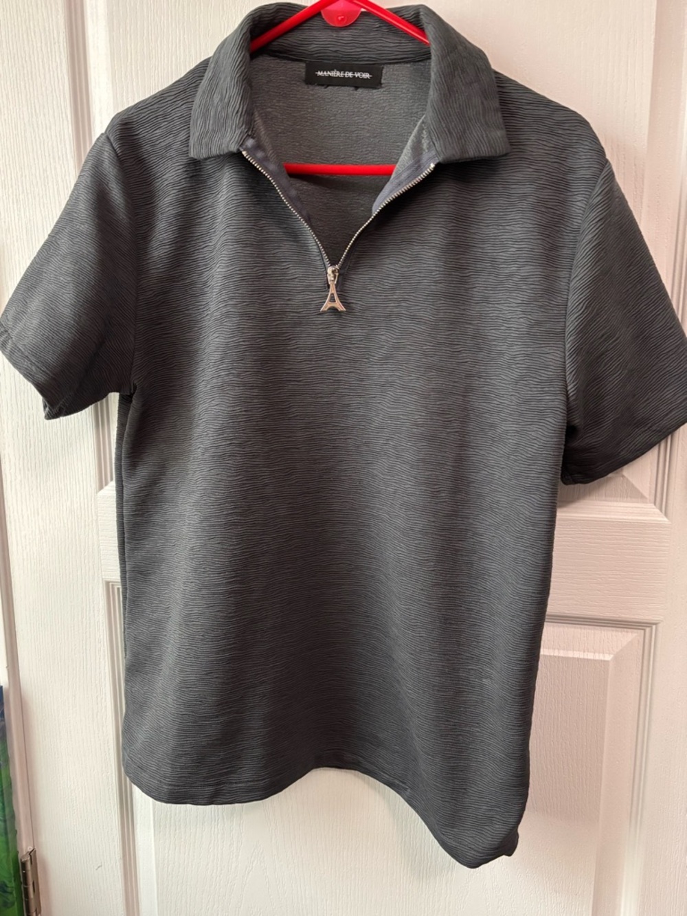 Maniere De Voir men’s textured 1/4 zip polo.